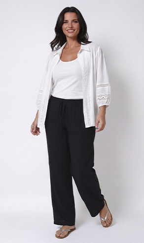 PLINO — White lace blouse worn over black trousers, new markdown — Jean Marc Philippe